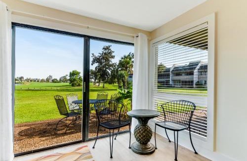 Upper Grand Lagoon House | Golf course-adjacent home with shuffleboard table & furnished patio