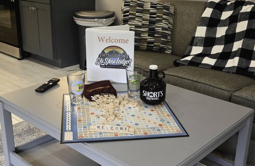 Mancelona Condo | Golf Lakes Summer fun! sleeps 5. KING BED. futon, sofa sleeper, laundry POOL