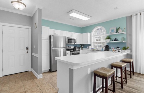 Central Myrtle Beach Apartment | Golf View - Pool - Full Kitchen - King Bed