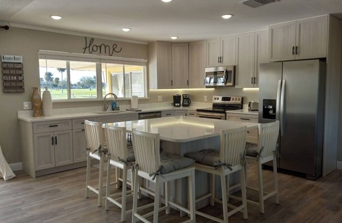 Melbourne House | GolfFront 4 Bed/3Bath Renovated Pool Home Sleeps14