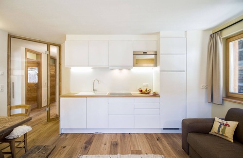 Selva di Val Gardena Apartment | Gorgeous Apartment Close to Ski Lifts with Wi-Fi, Parking and Garden