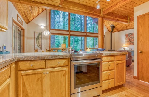 Rhododendron House | Gorgeous home with views of the river, fireplace, washer&dryer, & dog-friendly