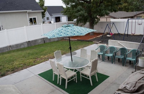 Sunset Heights House | Gorgeous island-themed retreat sleeps 30 in Orem, UT!