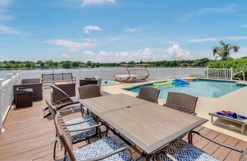 Mariner's VIllage House | Gorgeous Lakefront Pool Home W paddleboard, kayak, game room, king bed, and more