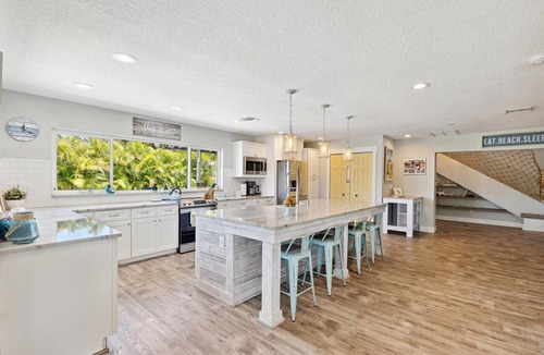 Cocoa Isles House | Gorgeous Private Canal Home w/Pool, Hot Tub & Modern Kitchen - Walk to Restaurants!