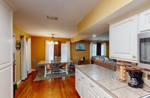 New Roads House | Gorgeous riverfront townhouse with balcony, boat dock & private W/D