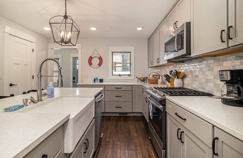 Beulah House | Gorgeous Sunsets at Crystal Lake Waterfront Home