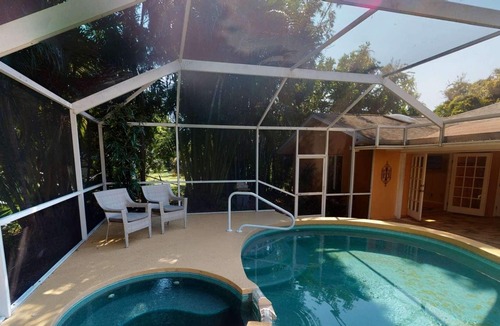 Bay Acres House | Gorgeous Updated Heated Saltwater Pool Home, WiFi, Dog Friendly, Kayak Launch & Park, Garage