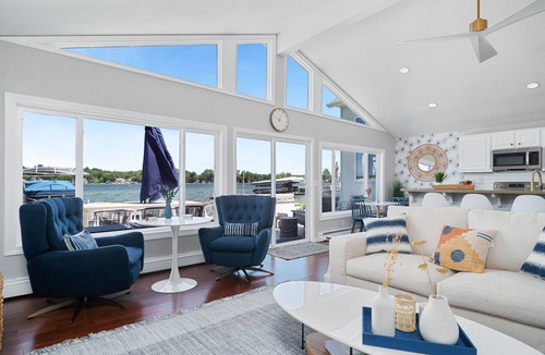 Angola House | Gorgeous Waterfront Home on Crooked Lake w/Hot Tub, AC, Dock, Swim on 2nd Basin