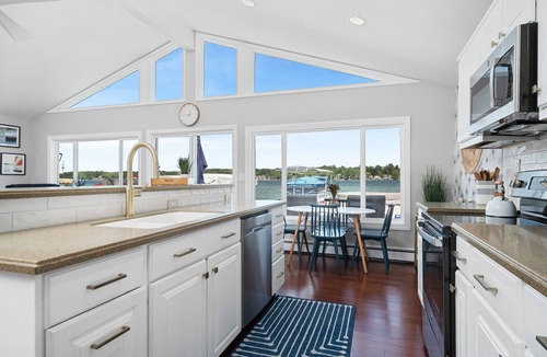 Angola House | Gorgeous Waterfront Home on Crooked Lake w/Hot Tub, AC, Dock, Swim on 2nd Basin