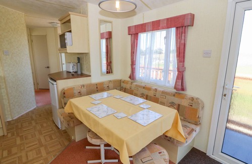 Cemaes Bay Cottage | GORPHWYSFA CARAVAN, pet friendly, with a garden in Cemaes Bay