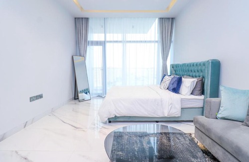 Discovery Gardens Apartment | Grace Residency