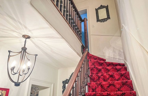 Springfield House | Graceful historic estate in south-east Springfield-stained glass, upper veranda