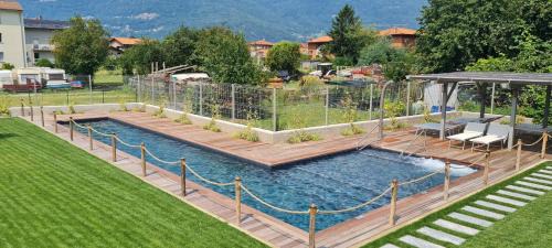 Dervio Ski Chalet | Green Chalet du lac - luxury property with swimming pool, large private garden and parking, few steps from the beach, ideal for families