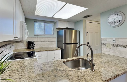 Butler Beach Condo | Ground-Floor Condo with Patio, Community Pool and Direct Beach Access.