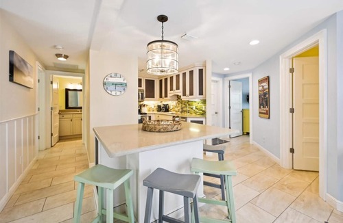Holmes Beach Cottage | Ground Floor Two Bedroom Island Styled Home on Beautiful Anna Maria. Close to Beaches!