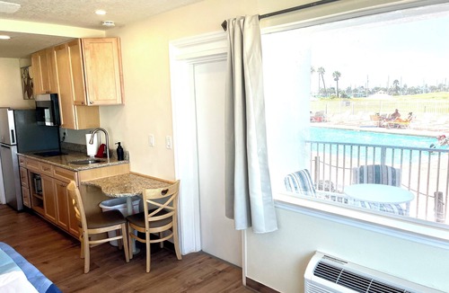 South Peninsula Historic District Condo | Ground Level Corner Unit with Windows Both on Gulf/pool
