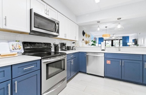 Cocoa Beach Condo | Ground Level Located Right on the Beach with Large Heated Pool and Tennis Court
