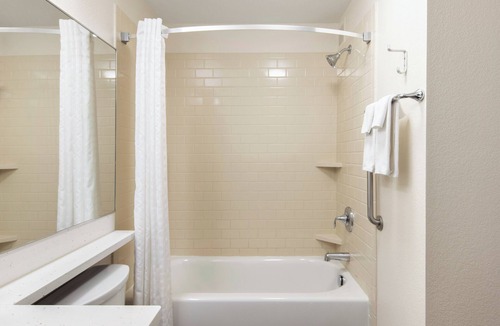 Anaheim Resort Hotel | Group Trip Ready! 3 Queen Stay Near Disney! Laundry, Fitness Center, BBQ & Pool!