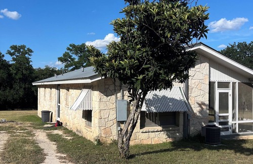 Hunt House | Guadalupe riverfront wooded Hill Country acreage located in Downtown Hunt, TX