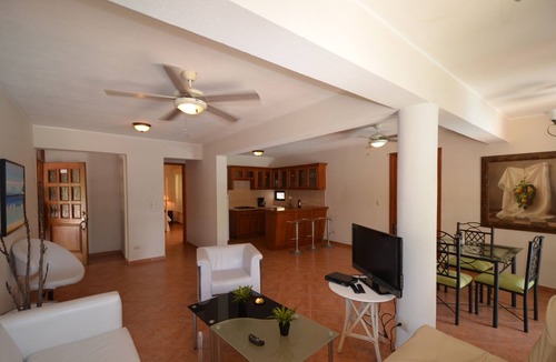 El Batey Apartment | Guest-friendly Beachfront Condo With Pool, Jacuzzi, A/C, Wifi, Near Everything