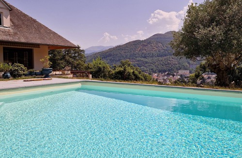 Lourdes Bed & Breakfast | guest room overlooking the town of Lourdes and splendid view of the Pyrenees