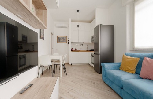 Lorenteggio Apartment | GuestHost - A comfortable and welcoming 65 square meters apartment, perfect for four people, located on the ground floor of a building.The property is strategically located: thanks to the nearby M4 metro line, guests can easily get around the city and re
