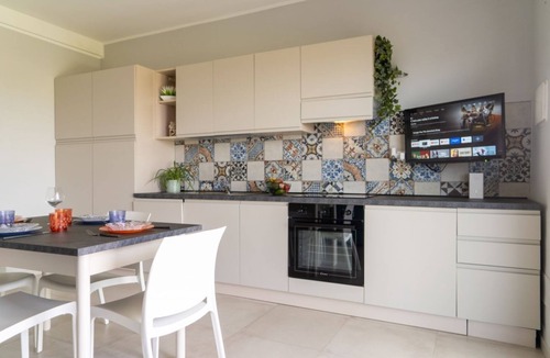 Pachino Apartment | GuestHost - Charming 75 sqm seaview apartment on two levels, for 5 people, located inside the renowned Borgo 84 residence, equipped with swimming pool and cycle path. The property is located just 3 km from the center of Marzamemi, one of the most fascina
