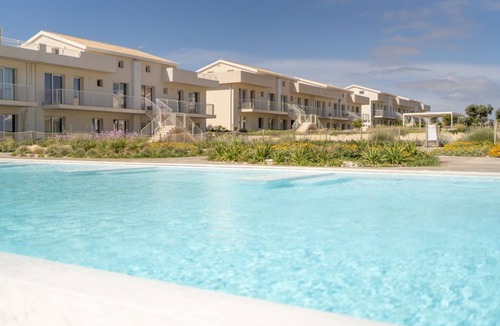 Pachino Apartment | GuestHost - Charming 75 sqm seaview apartment on two levels, for 5 people, located inside the renowned Borgo 84 residence, equipped with swimming pool and cycle path. The property is located just 3 km from the center of Marzamemi, one of the most fascina