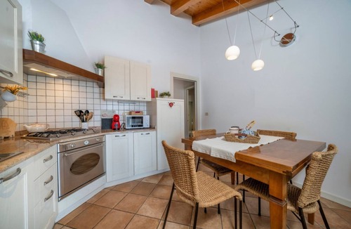 Palmanova Apartment | GuestHost - Charming apartment of about 90 sqm, able to accommodate up to 6 people, located on the second floor of a building without a lift.The property is located within the walls of Palmanova, the famous fortress-city in the shape of a nine-pointed st