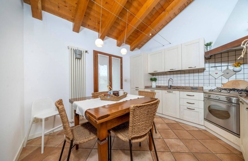 Palmanova Apartment | GuestHost - Charming apartment of about 90 sqm, able to accommodate up to 6 people, located on the second floor of a building without a lift.The property is located within the walls of Palmanova, the famous fortress-city in the shape of a nine-pointed st
