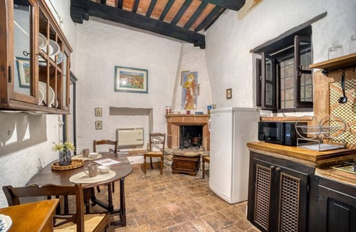 Magione Apartment | GuestHost - Comfortable apartment located in a historic Abbey from the year 1000, restored in 1980.La Badia is a small Benedictine Abbey immersed in a park of centuries-old olive trees.Located on the ground floor, there is a mezzanine for the sleeping ar