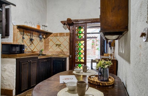 Magione Apartment | GuestHost - Comfortable apartment located in a historic Abbey from the year 1000, restored in 1980.La Badia is a small Benedictine Abbey immersed in a park of centuries-old olive trees.Located on the ground floor, there is a mezzanine for the sleeping ar
