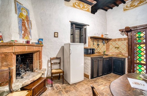 Magione Apartment | GuestHost - Comfortable apartment located in a historic Abbey from the year 1000, restored in 1980.La Badia is a small Benedictine Abbey immersed in a park of centuries-old olive trees.Located on the ground floor, there is a mezzanine for the sleeping ar