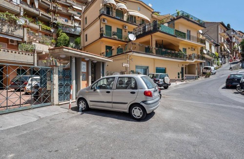 Taormina Apartment | GuestHost - Comfortable 50 sqm apartment with terrace, able to accommodate up to 4 people, located on the fifth floor of a building with lift (NOT suitable for disabled people - 15 steps to access it). The property is located in a quiet area of ​Tao