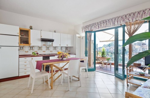 Taormina Apartment | GuestHost - Comfortable 50 sqm apartment with terrace, able to accommodate up to 4 people, located on the fifth floor of a building with lift (NOT suitable for disabled people - 15 steps to access it). The property is located in a quiet area of ​Tao