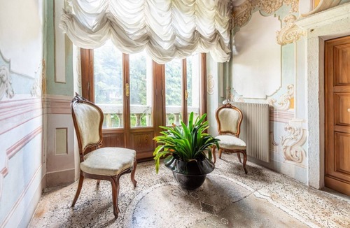 Belluno Apartment | GuestHost - Elegant 350 sqm apartment for 6 people, located on two levels of a historic 18th century villa. The villa, with fine furnishings and frescoed galleries, will enchant you with its rooms, where history and comfort blend to give you an unforgett