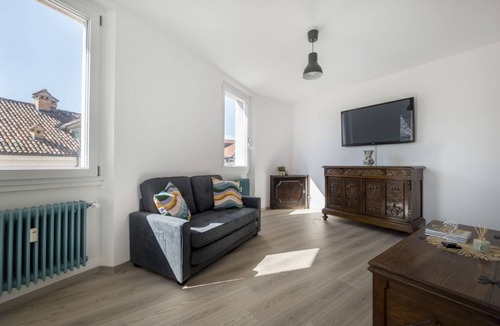 Belluno Apartment | GuestHost - Elegant apartment of 65 sqm, for 4 people, located on the third floor of a building with an elevator (NOT suitable to disabled guests - 4 steps). The property is located in the heart of Belluno's historic center, in a panoramic position offer