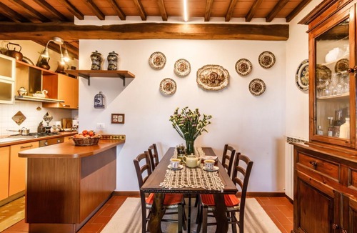 Monteaperti Apartment | GuestHost - Nestled between the Crete Senesi and Chianti, this home offers a breathtaking view of the countryside and Siena, just a 10-minute drive away. Part of a renovated historic farmhouse, it is a well-furnished townhouse with a private garden and v