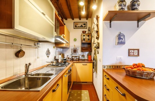 Monteaperti Apartment | GuestHost - Nestled between the Crete Senesi and Chianti, this home offers a breathtaking view of the countryside and Siena, just a 10-minute drive away. Part of a renovated historic farmhouse, it is a well-furnished townhouse with a private garden and v