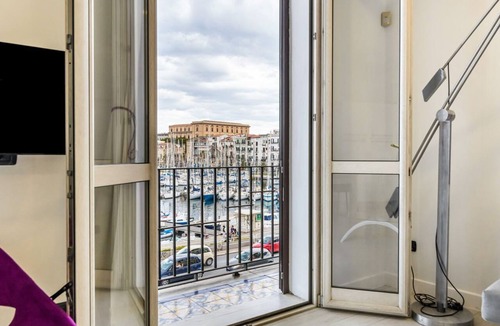 Castellammare Vucciria Apartment | GuestHost - Modern 83 sqm apartment, perfect for 5 people, located on the second floor of an ancient building (NO lift and some steps to access it). The property is located in La Cala, a picturesque port located in the heart of Palermo, just 12 minutes o