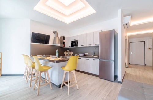Chiavari Apartment | GuestHost - Modern and comfortable apartment ideal for 2 guests located in a residential area of Chiavari, a few steps from the historic center and the beach. The accommodation is equipped with every comfort: equipped terrace, kitchen, washing machine, a