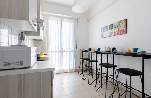 Sant'Antonio Apartment | GuestHost - This cozy and bright 124 sqm penthouse apartment can accommodate up to 6 people and is located on the 6th floor of a 1970s building with lift.The apartment boasts a splendid view over the city of Pisa, which guests can admire from one of its