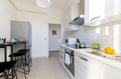 Sant'Antonio Apartment | GuestHost - This cozy and bright 124 sqm penthouse apartment can accommodate up to 6 people and is located on the 6th floor of a 1970s building with lift.The apartment boasts a splendid view over the city of Pisa, which guests can admire from one of its