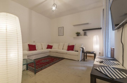 Salario Apartment | GuestHost - This spacious 180sqm apartment with four bedrooms is able to accommodate up to 8 people. Located on the first floor (with elevator) of a restored period building, the apartment overlooks the private park of Villa Albani, one of the most beaut