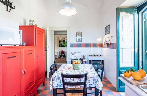 Trecastagni Villa | GuestHost - Wonderful 19th-century villa of about 190 sqm, on two levels, able to accommodate up to 10 people. The villa, with panoramic views of Mount Etna, boasts a large garden with olive grove and an external courtyard. The property is located in Tre