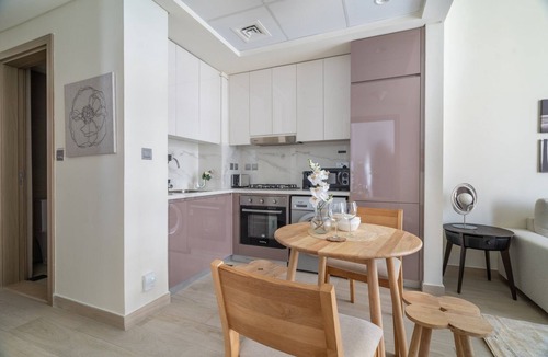 Nad Al Sheba Apartment | GuestReady - 1BDR Mediterranean Design l Pool View