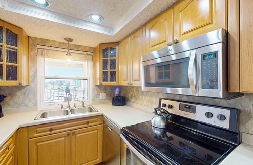 Redington Shores Condo | Gulf front with heated pool hot tub and direct beach access with WIFI and AC