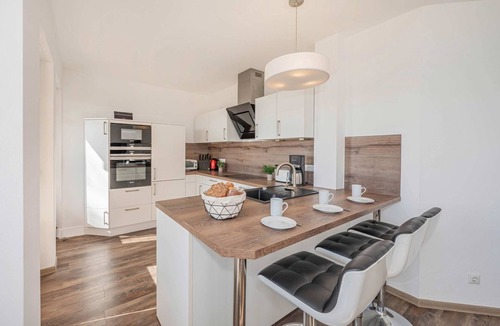 Kamminke Apartment | Haffblick - Modern vacation apartment with terrace & lake view - only 350 m to the lagoon