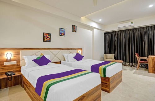 Palm Meadows Hotel | Happy Stays